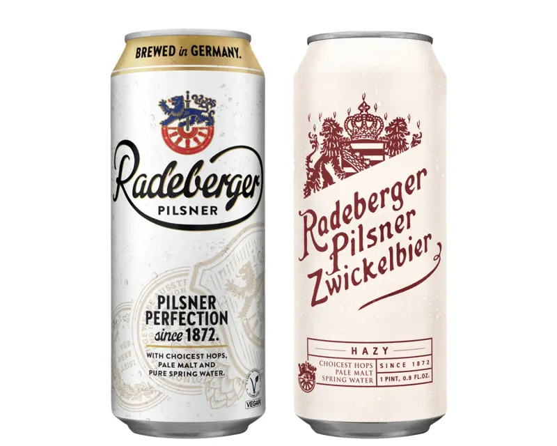 Next to a Radeberger beer cans is a Radeberger Zwickel beer can.