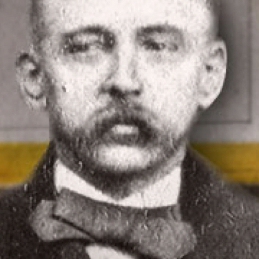 Portrait of a man with a mustache and bow tie, serious expression.